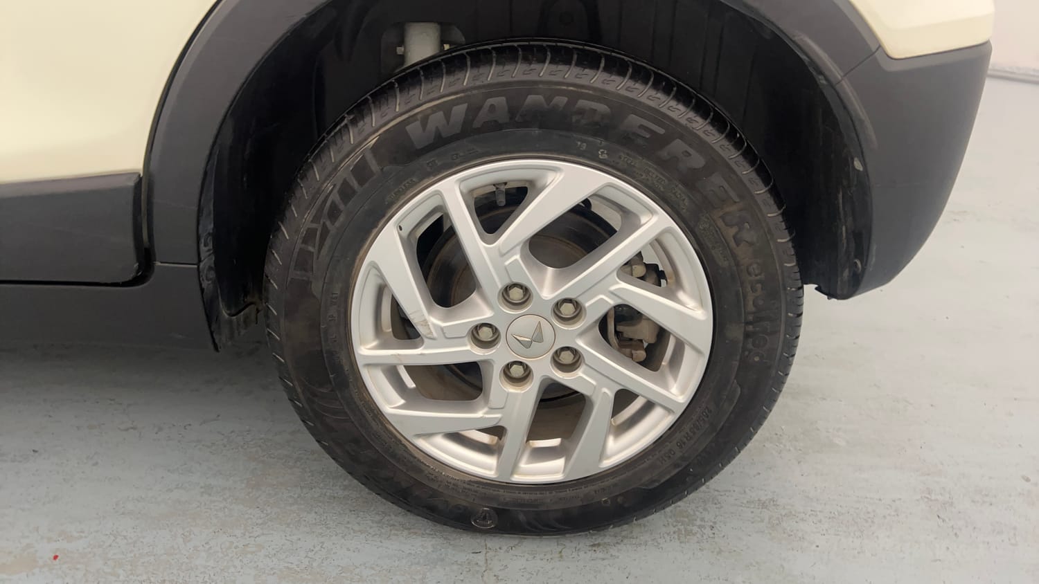 Used 2023 Mahindra XUV 300 W8 1.2 Petrol Petrol Manual tyres LEFT REAR TYRE RIM VIEW