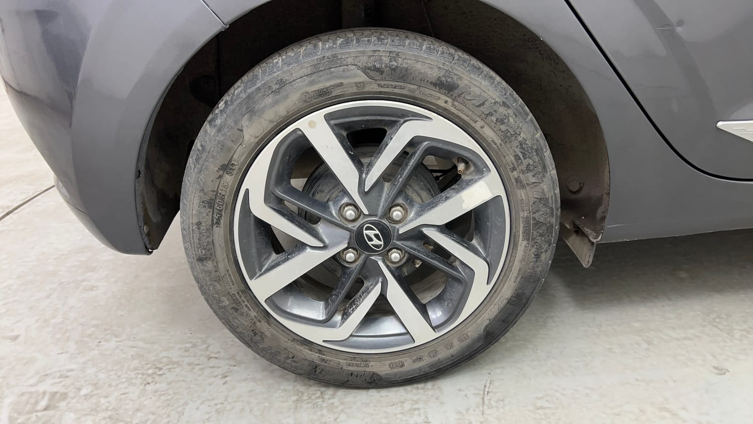 Used 2021 Hyundai Grand i10 Nios Sportz AMT 1.2 Kappa VTVT Petrol Automatic tyres RIGHT REAR TYRE RIM VIEW