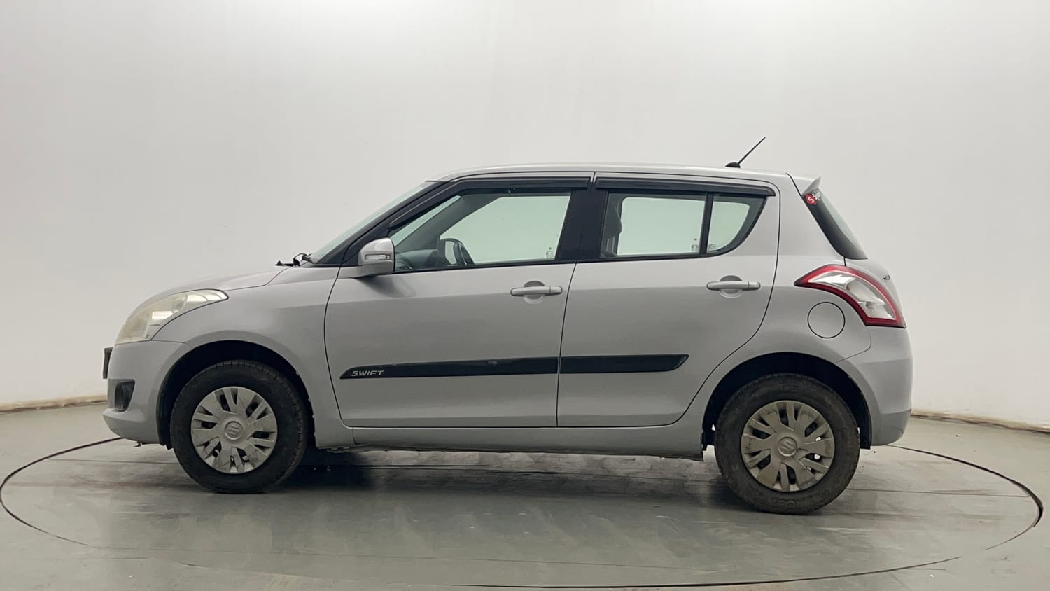 Used 2013 Maruti Suzuki Swift VXi Petrol Manual exterior LEFT SIDE VIEW