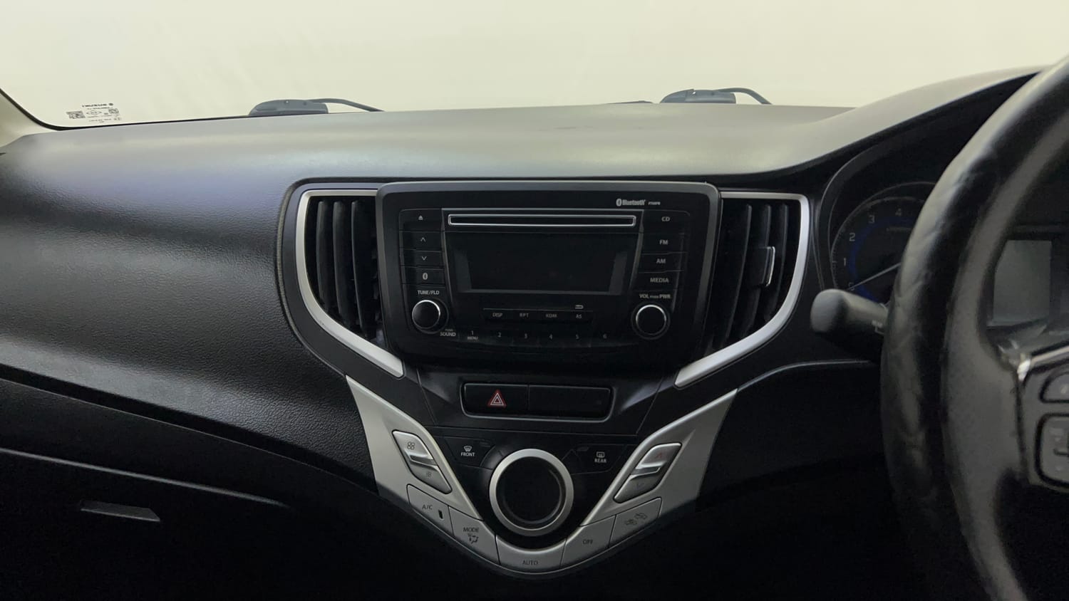 Used 2019 Maruti Suzuki Baleno Delta 1.2 Petrol Manual top_features Integrated (in-dash) music system