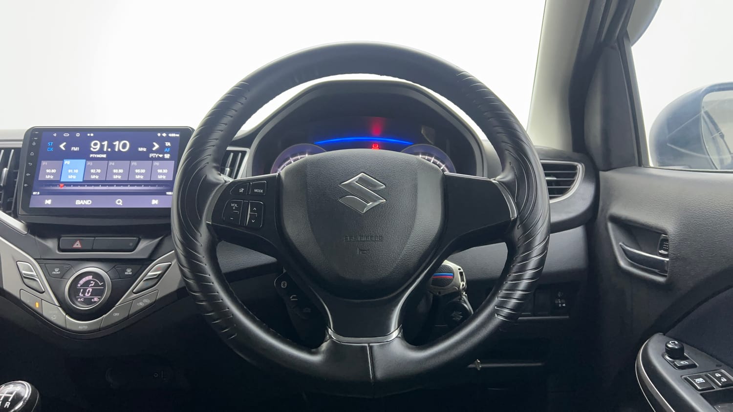 Used 2021 Maruti Suzuki Baleno Delta Petrol Manual interior STEERING VIEW