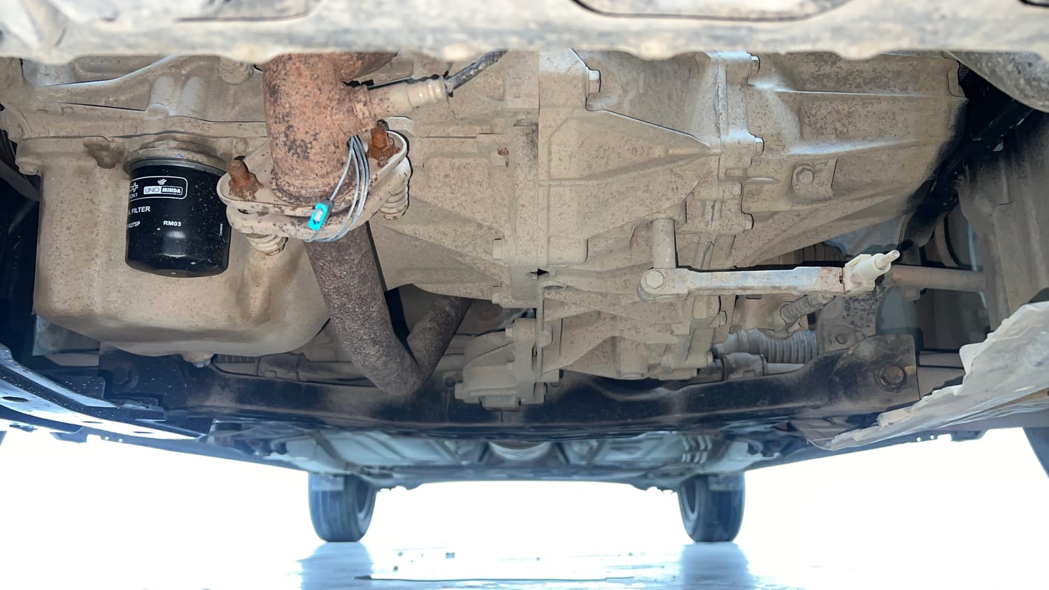 Used 2021 Maruti Suzuki Baleno Sigma Petrol Manual extra FRONT LEFT UNDERBODY VIEW