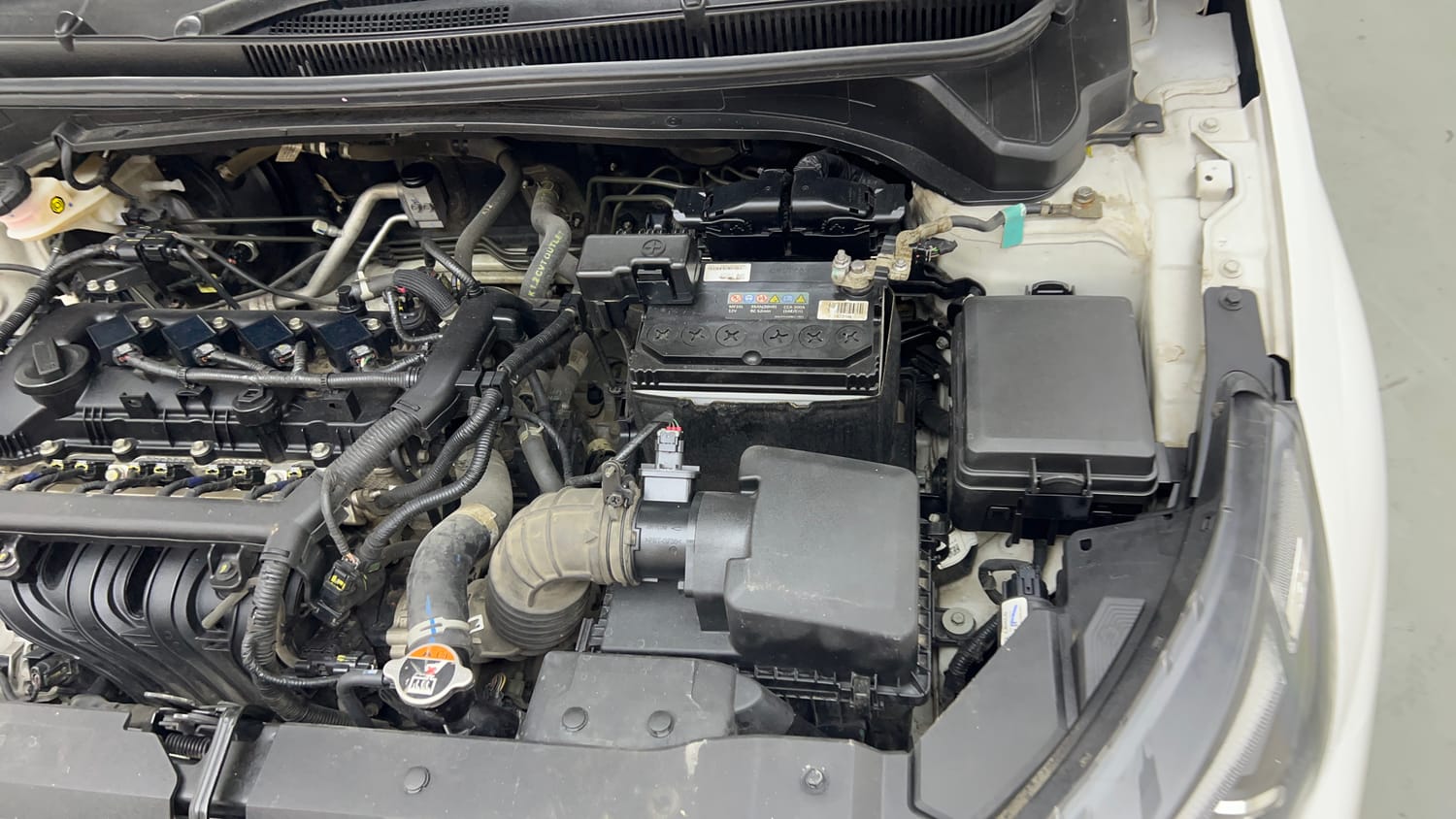 Used 2023 Hyundai i20 Asta (O) 1.2 IVT Petrol Automatic engine ENGINE LEFT SIDE VIEW