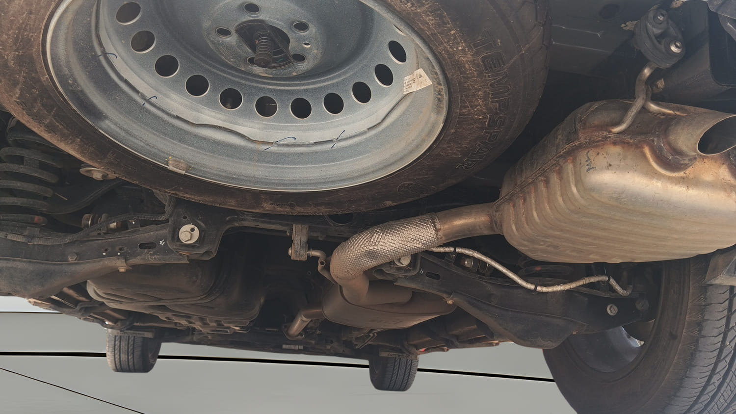 Used 2025 Mahindra XUV700 AX7 Luxury Pack Petrol AT 7 STR Petrol Automatic extra REAR RIGHT UNDERBODY VIEW