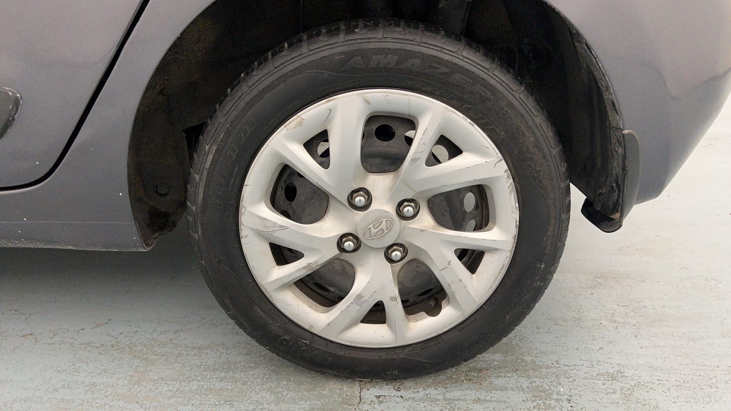 Used 2018 Hyundai Grand i10 Sportz 1.2 Kappa VTVT Petrol Manual tyres LEFT REAR TYRE RIM VIEW