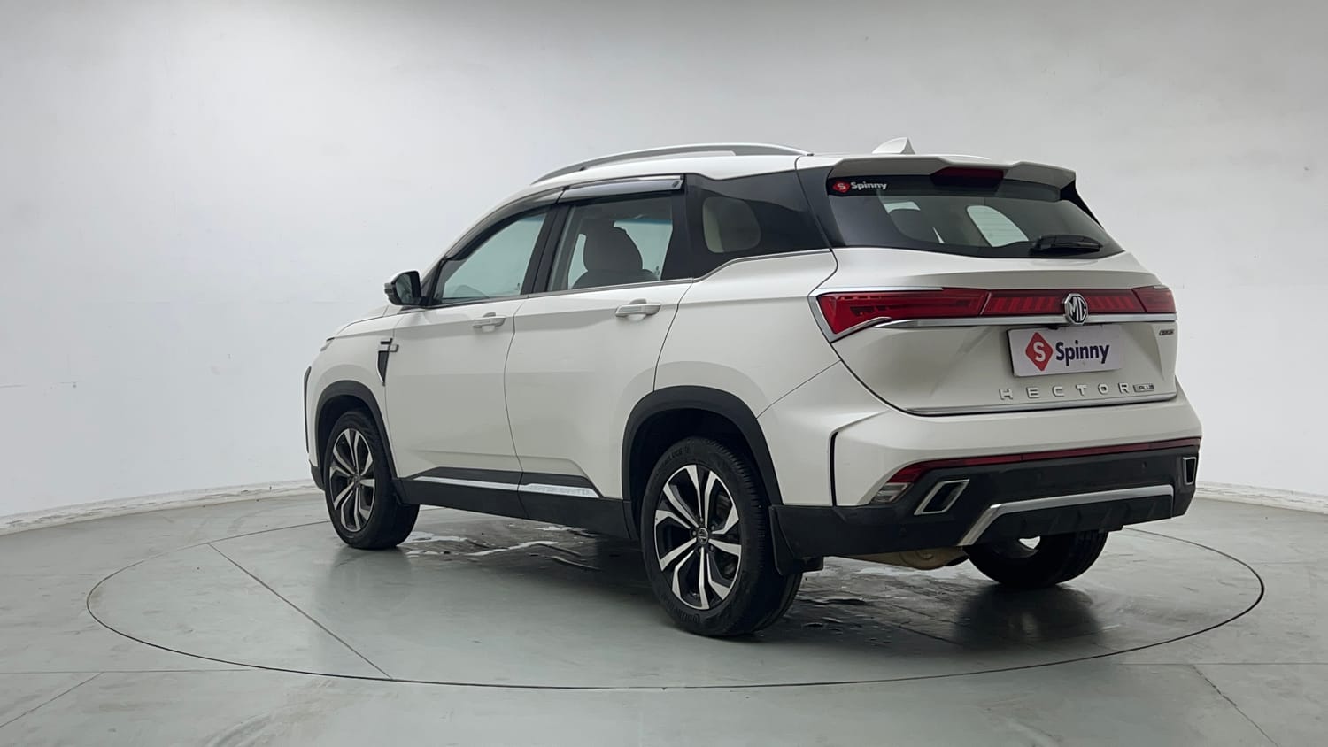 Used 2023 MG Motors Hector Plus Savvy Pro 1.5 Turbo Petrol CVT 6 STR Petrol Automatic exterior LEFT REAR CORNER VIEW
