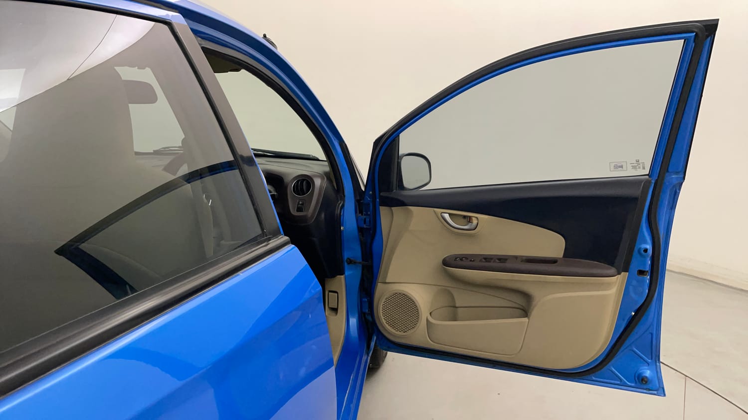 Used 2013 Honda Brio VX MT Petrol Manual interior RIGHT FRONT DOOR OPEN VIEW