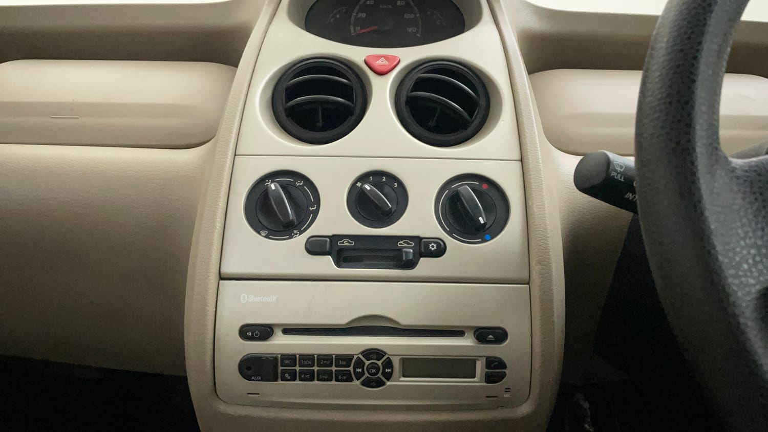 Used 2015 Tata Nano Twist XT Petrol Manual top_features Integrated (in-dash) music system
