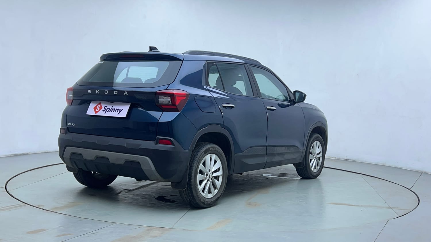 Used 2025 Skoda Kylaq Signature Plus 1.0 TSI MT (Lava Blue) Petrol Manual exterior RIGHT REAR CORNER VIEW