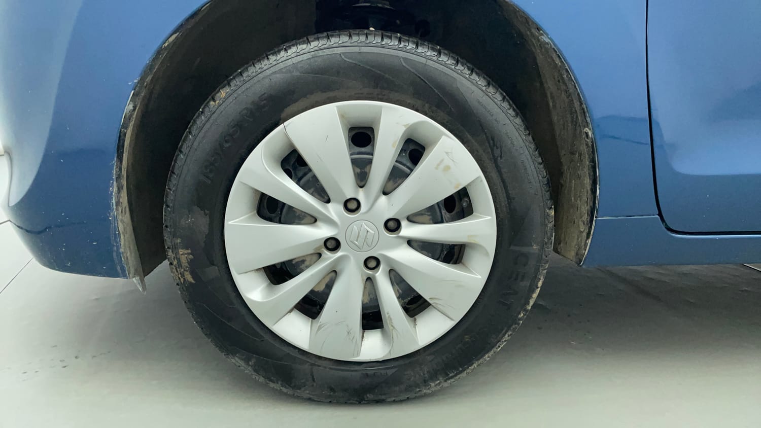 Used 2018 Maruti Suzuki Baleno Delta 1.2 Petrol Manual tyres LEFT FRONT TYRE RIM VIEW