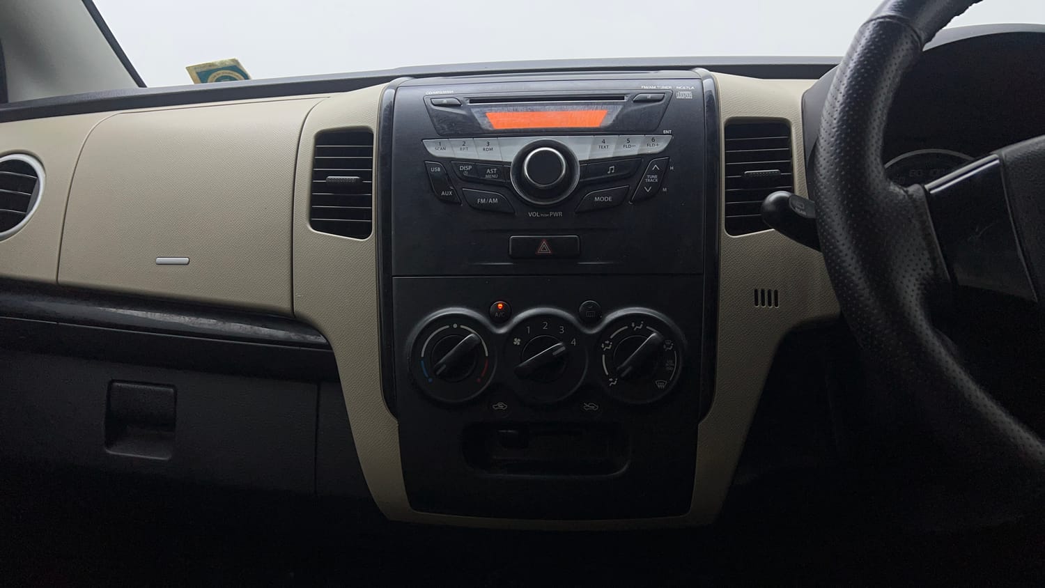 Used 2018 Maruti Suzuki Wagon R VXI Petrol Manual top_features Integrated (in-dash) music system