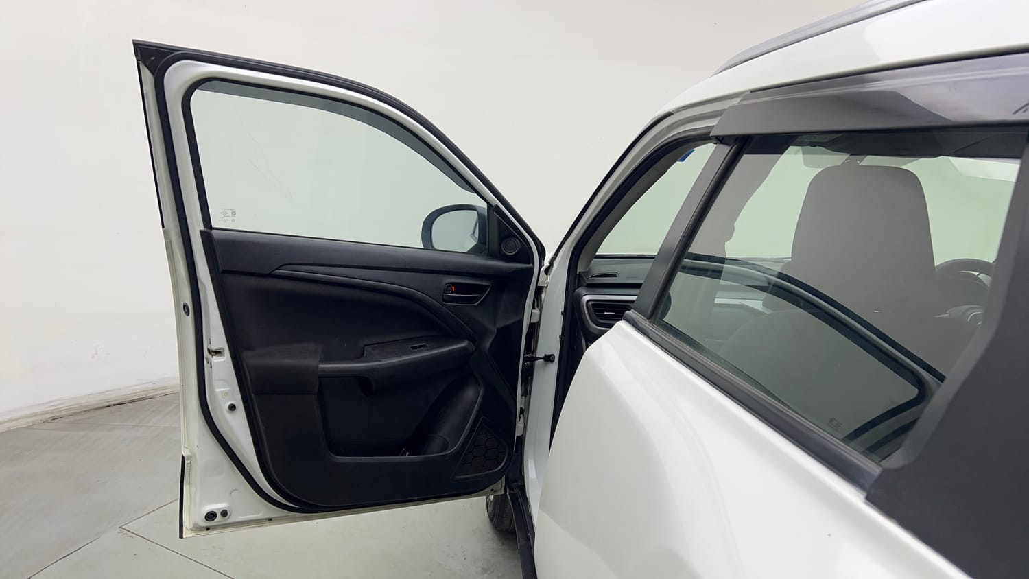 Used 2022 Maruti Suzuki Brezza VXi Petrol Manual interior LEFT FRONT DOOR OPEN VIEW