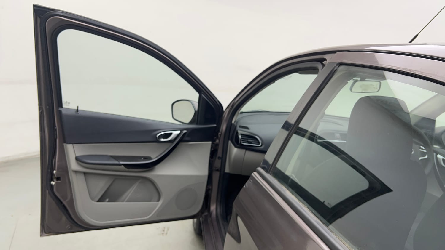 Used 2017 Tata Tiago Revotron XZ w/o Alloy Petrol Manual interior LEFT FRONT DOOR OPEN VIEW