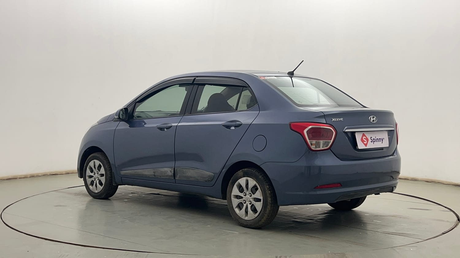 Used 2015 Hyundai Xcent S 1.2 Petrol Manual exterior LEFT REAR CORNER VIEW