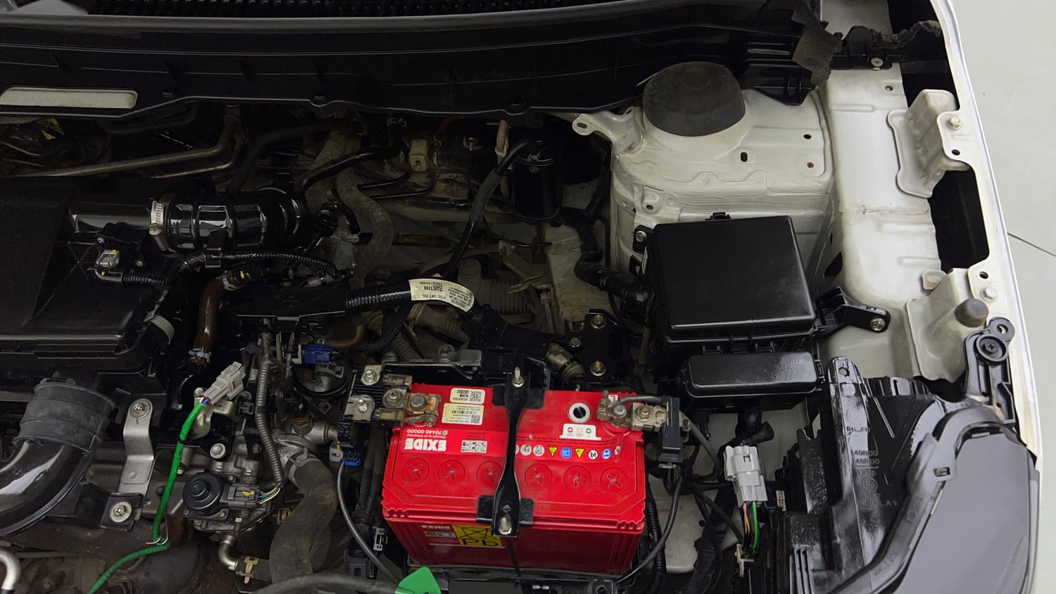 Used 2022 Maruti Suzuki Brezza VXi Petrol Manual engine ENGINE LEFT SIDE VIEW