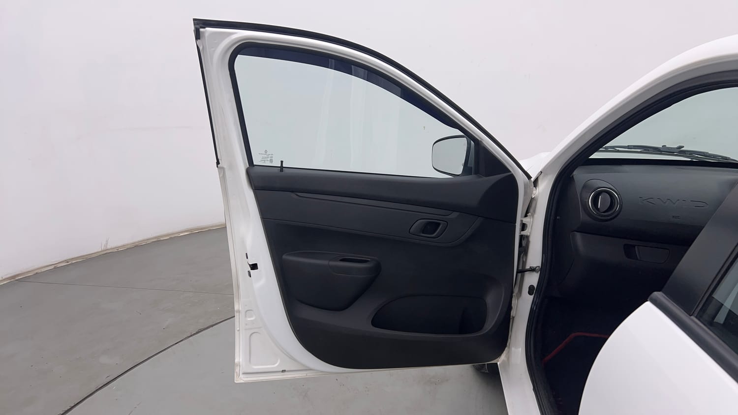 Used 2024 Renault Kwid RXT 1.0 AMT Petrol Automatic interior LEFT FRONT DOOR OPEN VIEW