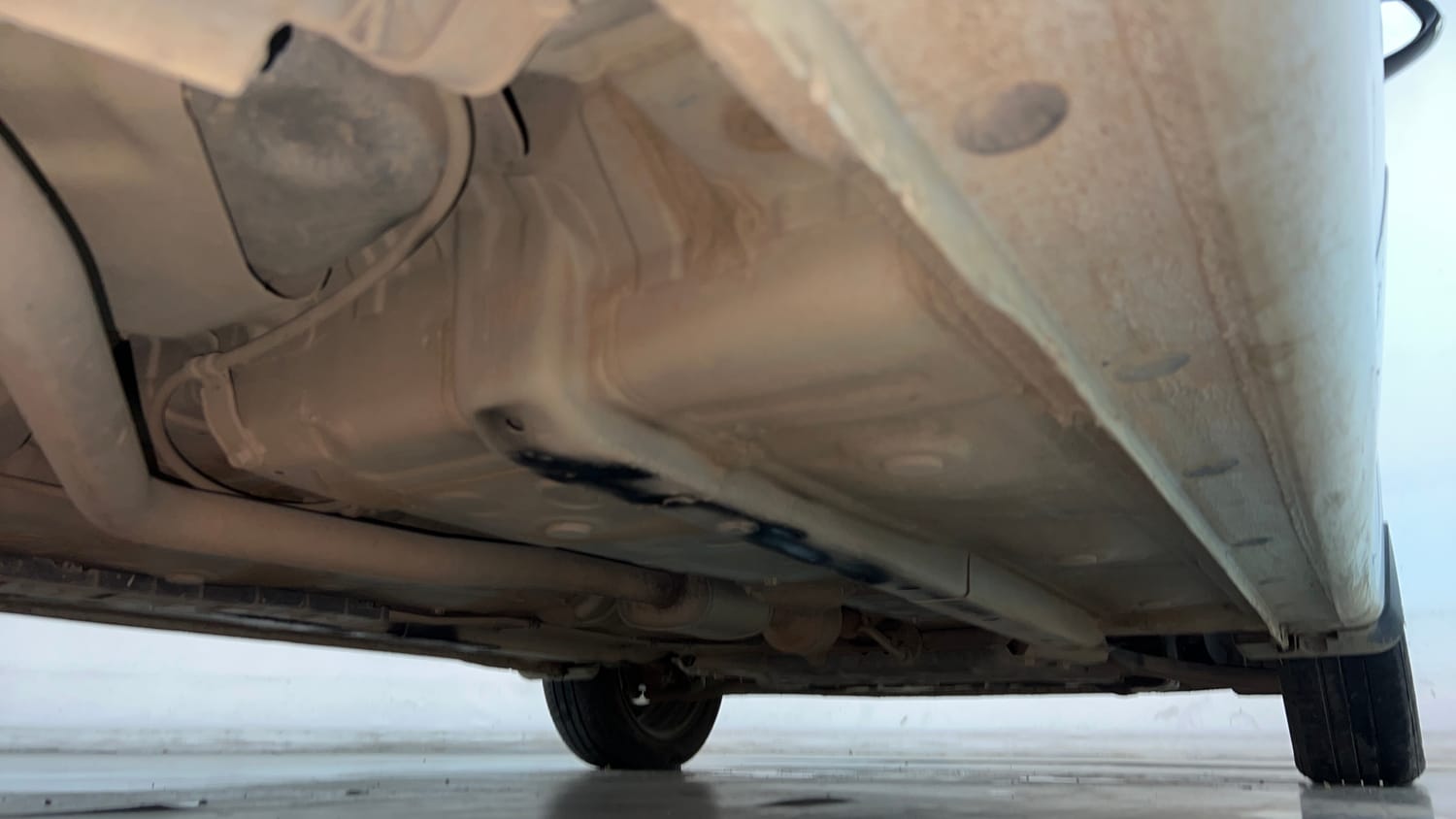 Used 2021 Hyundai Aura S 1.2 AMT Petrol Petrol Automatic extra REAR RIGHT UNDERBODY VIEW