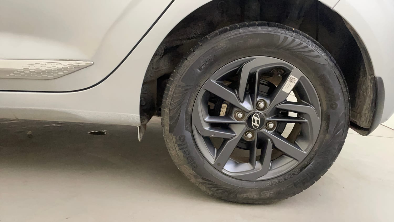 Used 2022 Hyundai Grand i10 Nios Sportz AMT 1.2 Kappa VTVT Petrol Automatic tyres LEFT REAR TYRE RIM VIEW