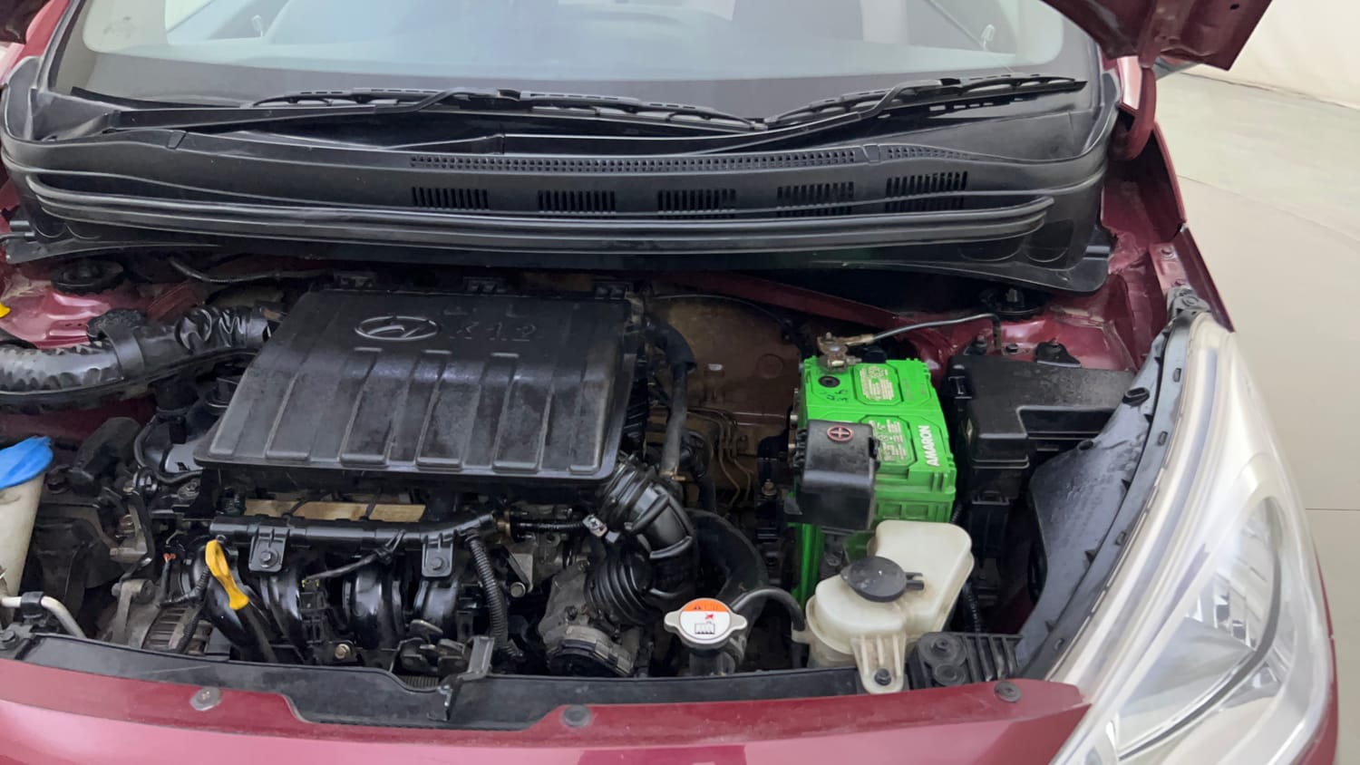 Used 2016 Hyundai Grand i10 Sportz 1.2 Kappa VTVT Petrol Manual engine ENGINE LEFT SIDE HINGE & APRON VIEW