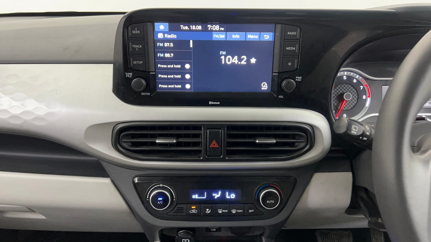 Used 2021 Hyundai Grand i10 Nios Sportz AMT 1.2 Kappa VTVT Petrol Automatic interior MUSIC SYSTEM & AC CONTROL VIEW