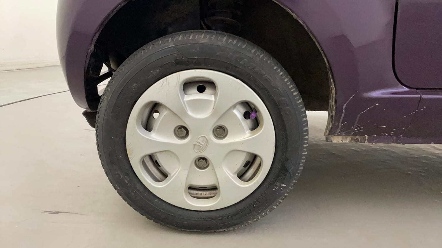 Used 2015 Tata Nano Twist XT Petrol Manual tyres LEFT FRONT TYRE RIM VIEW