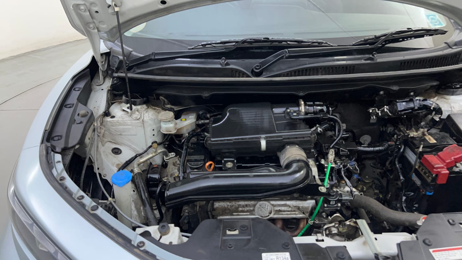Used 2024 Maruti Suzuki Fronx Delta Plus (O) 1.2L MT Petrol Manual engine ENGINE RIGHT SIDE HINGE & APRON VIEW