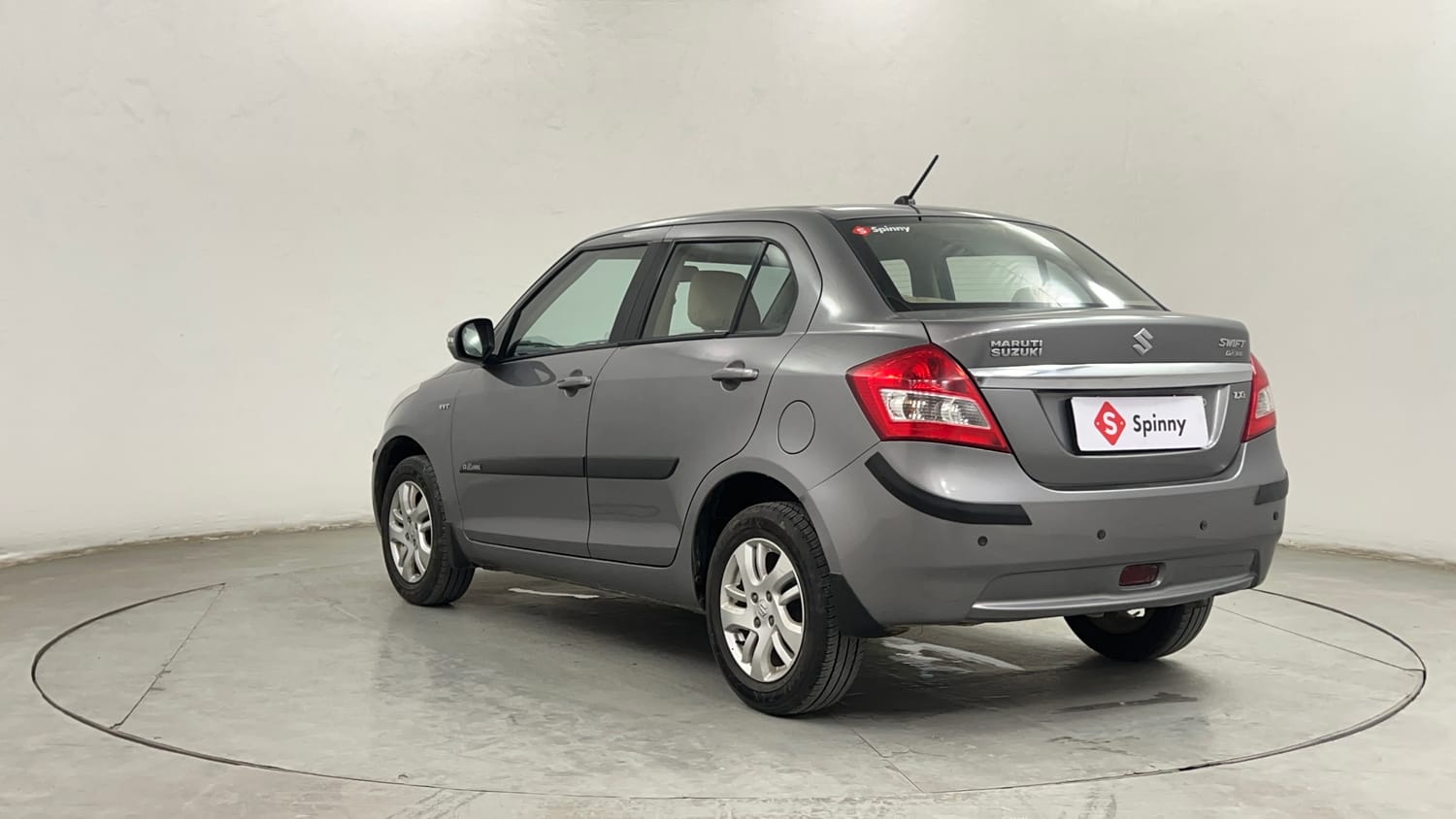 Used 2014 Maruti Suzuki Swift Dzire ZXI Petrol Manual exterior LEFT REAR CORNER VIEW
