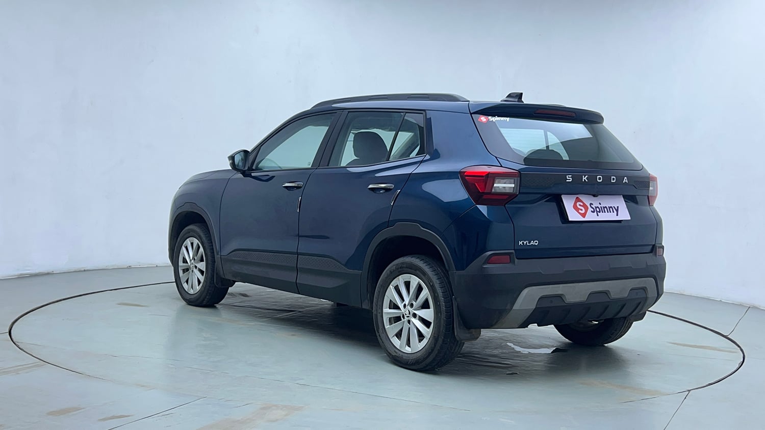 Used 2025 Skoda Kylaq Signature Plus 1.0 TSI MT (Lava Blue) Petrol Manual exterior LEFT REAR CORNER VIEW