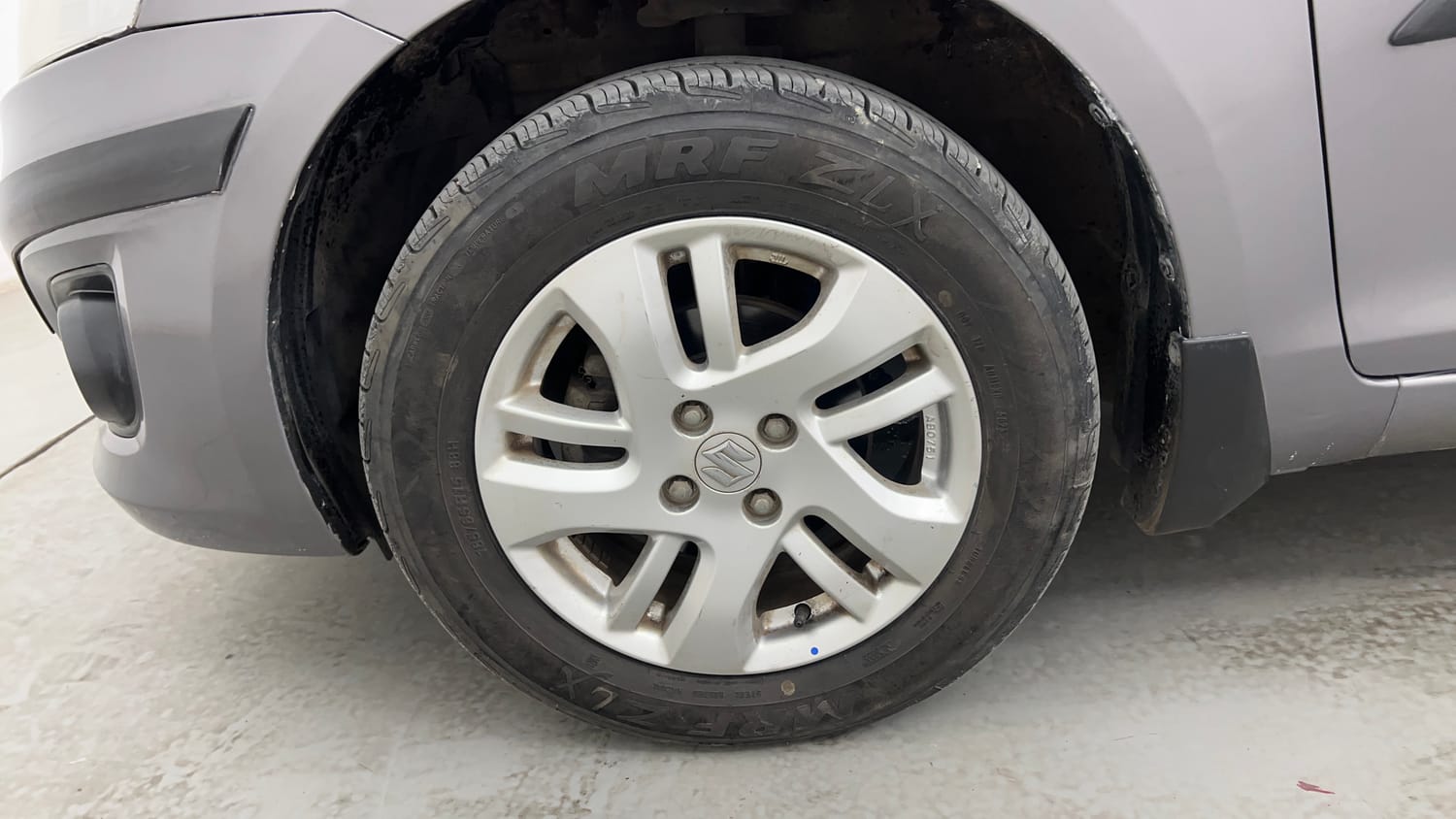 Used 2014 Maruti Suzuki Swift Dzire ZXI Petrol Manual tyres LEFT FRONT TYRE RIM VIEW