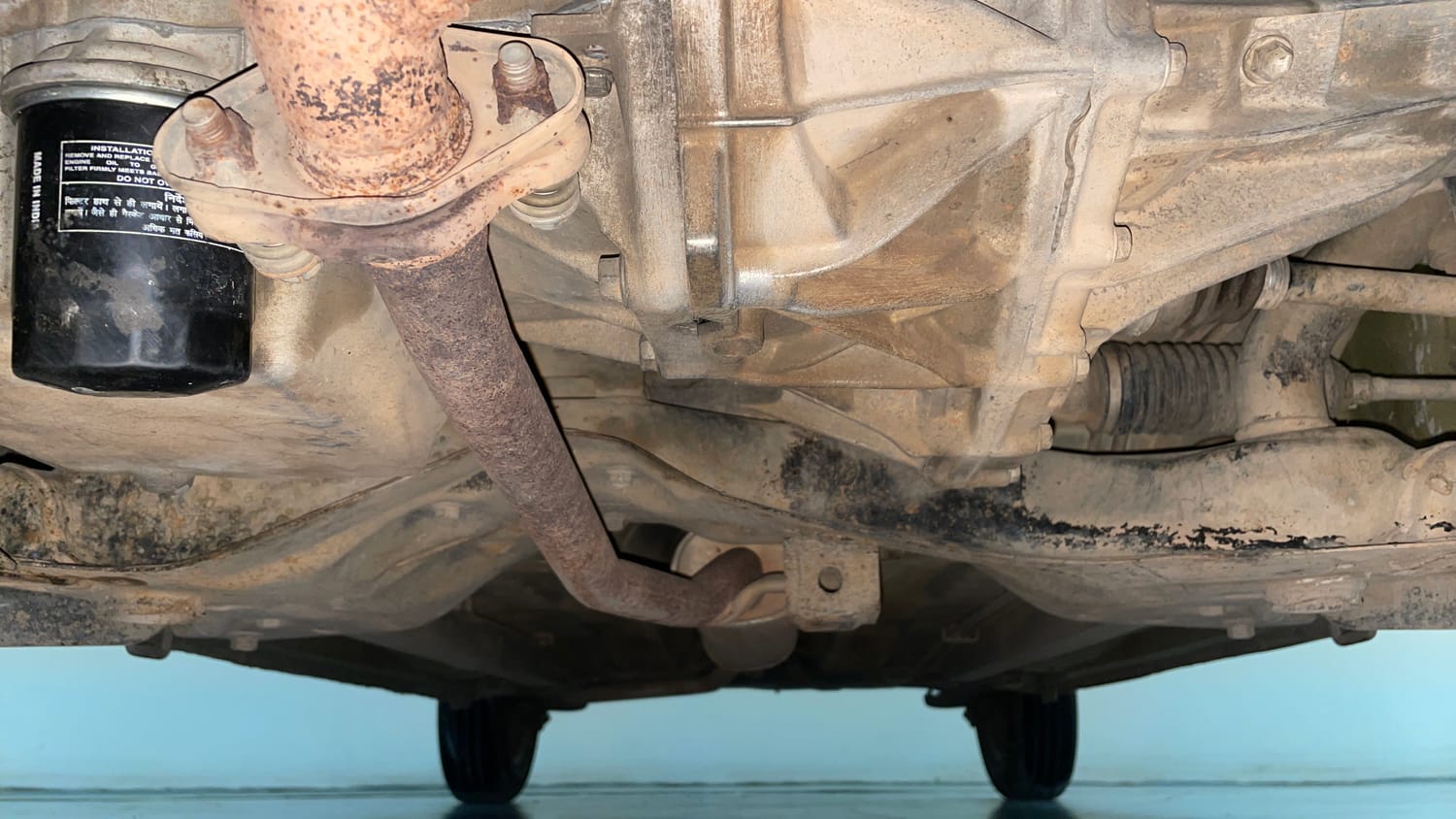 Used 2014 Maruti Suzuki Celerio VXi AMT Petrol Automatic extra FRONT LEFT UNDERBODY VIEW