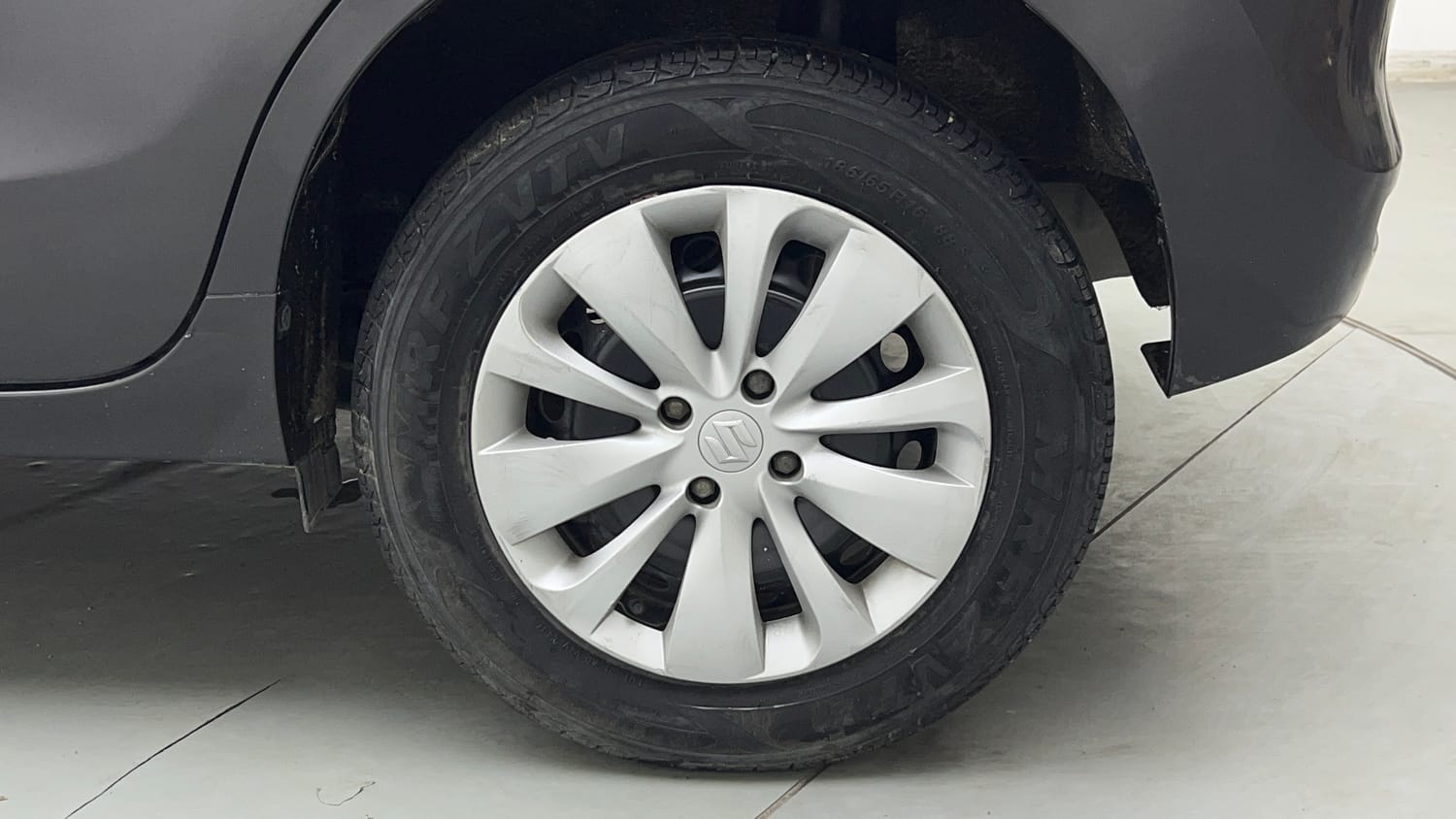 Used 2017 Maruti Suzuki Baleno Delta 1.2 Petrol Manual tyres LEFT REAR TYRE RIM VIEW
