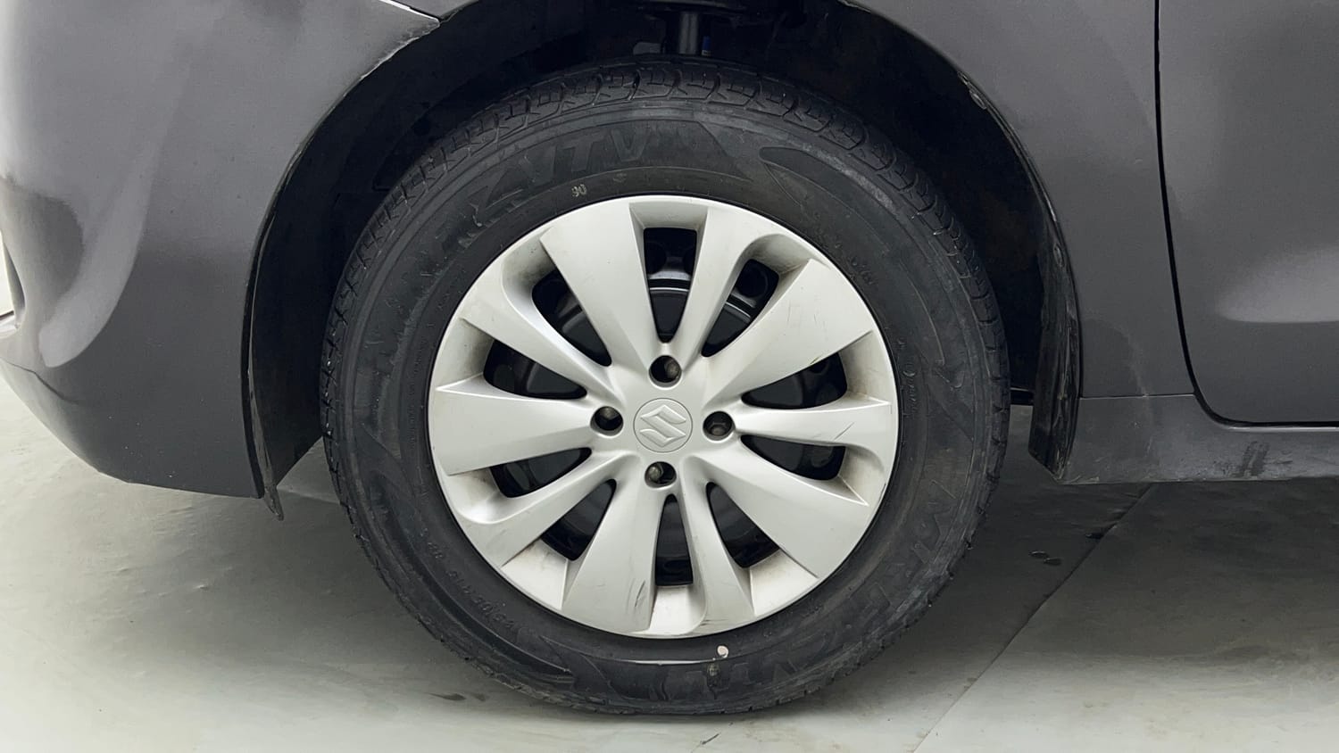 Used 2017 Maruti Suzuki Baleno Delta 1.2 Petrol Manual tyres LEFT FRONT TYRE RIM VIEW