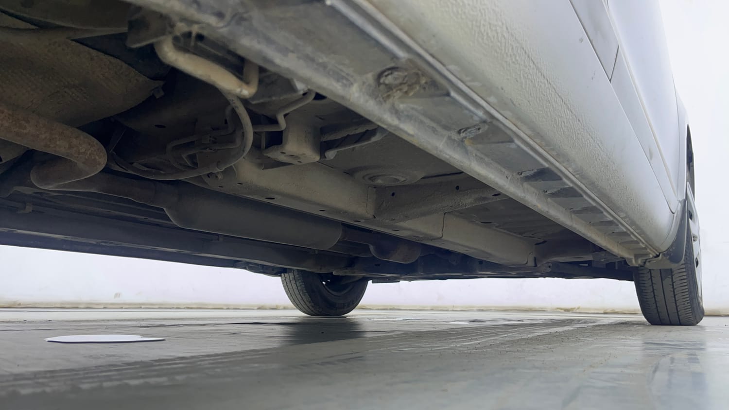 Used 2014 Maruti Suzuki Swift Dzire VXI Petrol Manual extra REAR RIGHT UNDERBODY VIEW