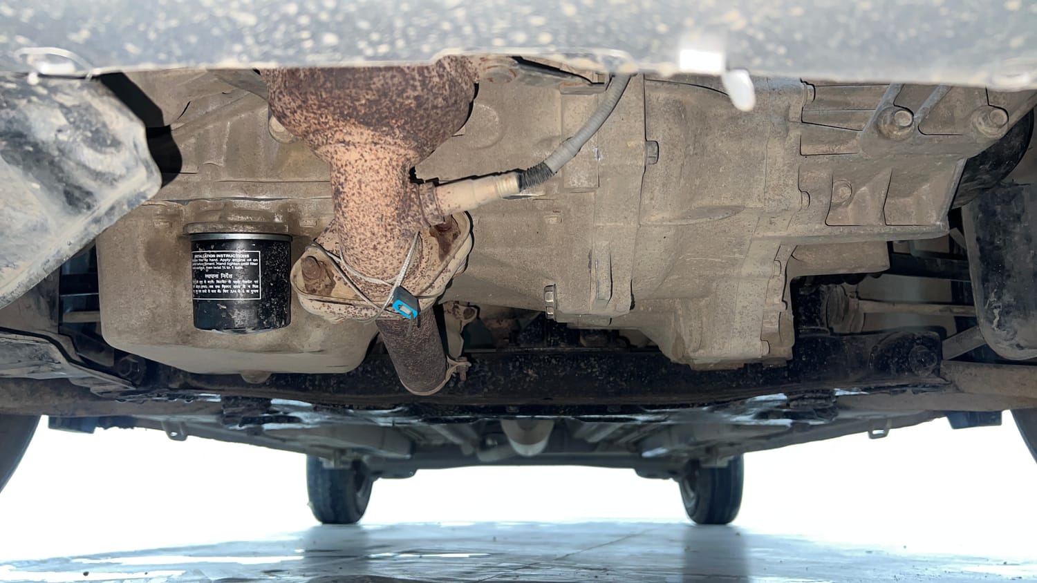 Used 2015 Maruti Suzuki Ritz Vxi BS-IV Petrol Manual extra FRONT LEFT UNDERBODY VIEW