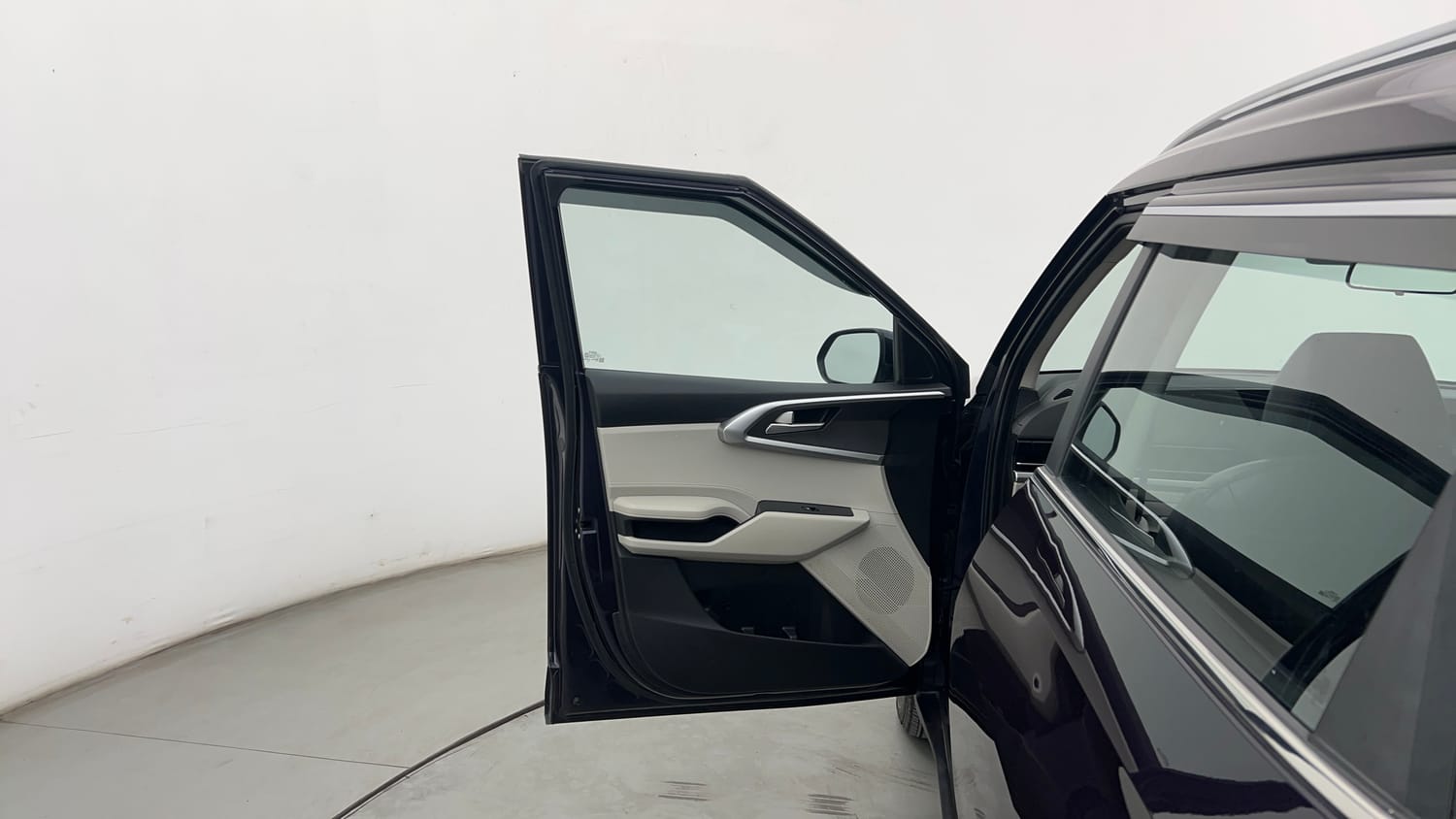 Used 2023 Kia Carens Prestige 1.4 Petrol MT 7 STR Petrol Manual interior LEFT FRONT DOOR OPEN VIEW