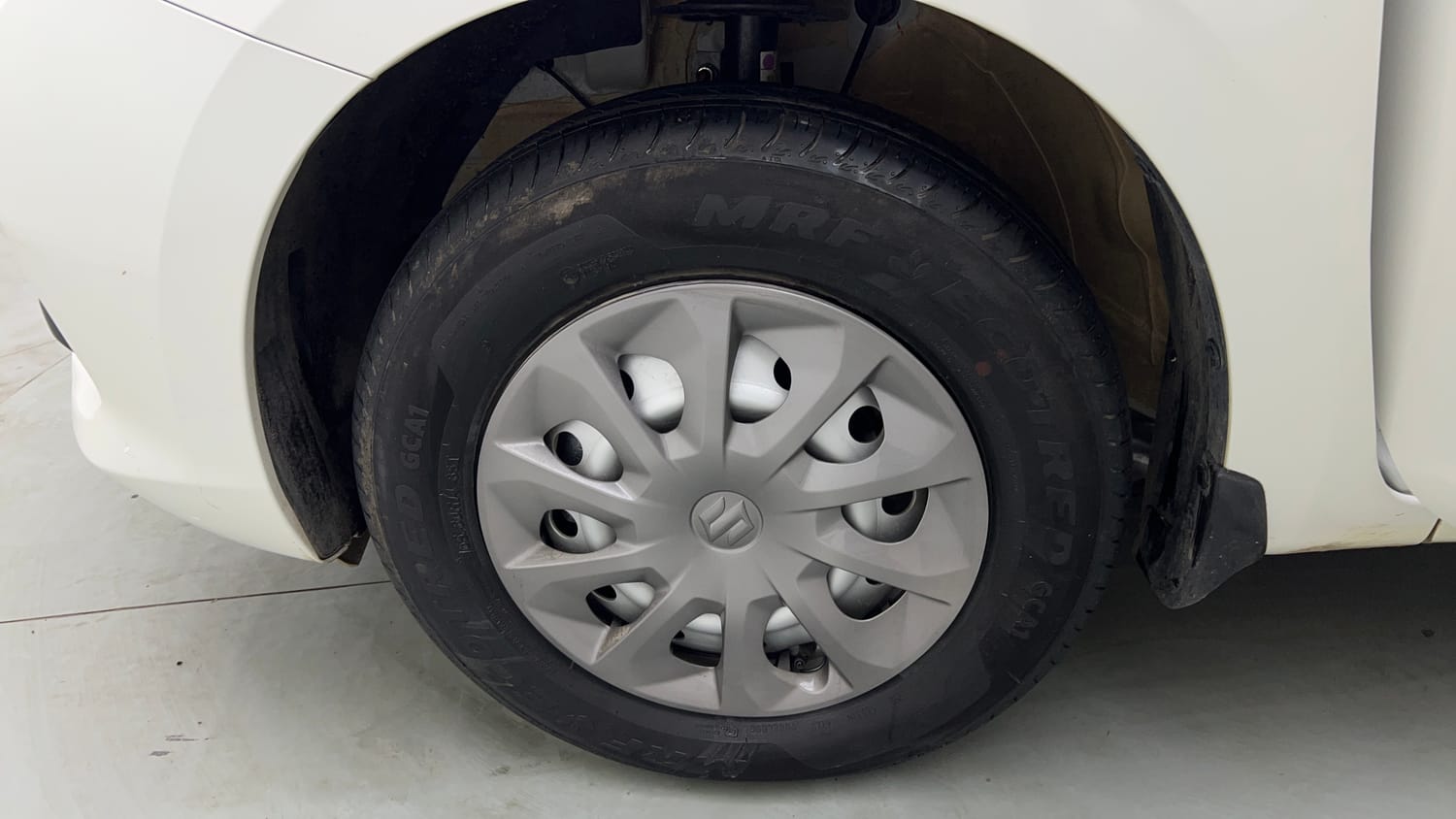 Used 2025 Maruti Suzuki Swift LXi Petrol Manual tyres LEFT FRONT TYRE RIM VIEW