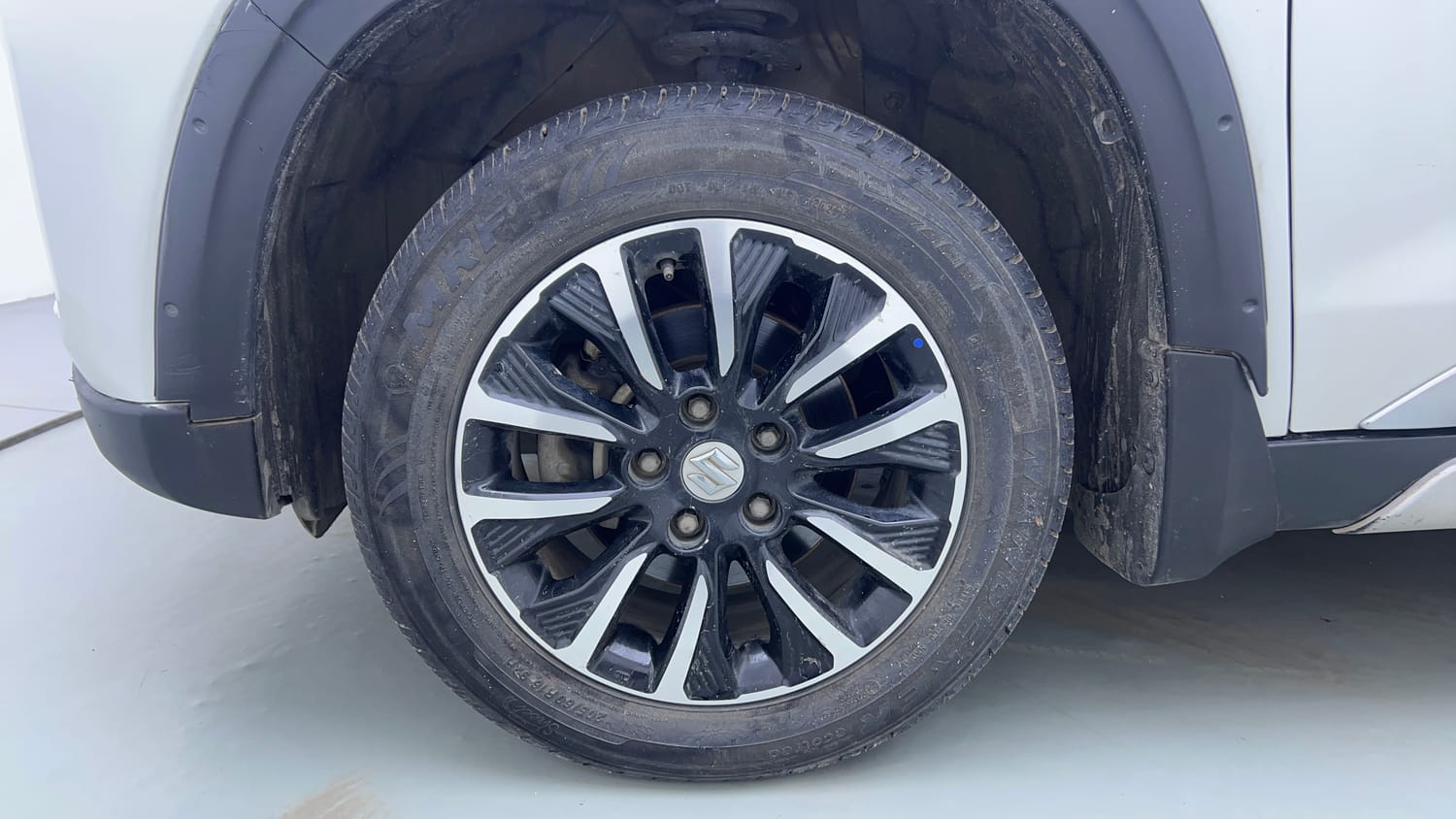 Used 2021 maruti-suzuki Vitara Brezza LXi Petrol Manual tyres LEFT FRONT TYRE RIM VIEW
