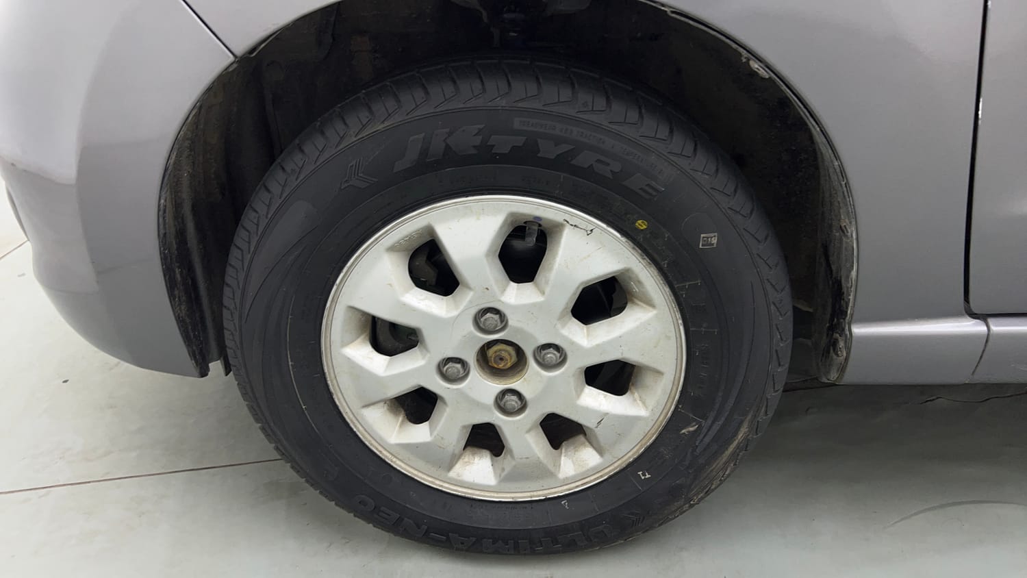 Used 2013 Maruti Suzuki A-Star ZXI Petrol Manual tyres LEFT FRONT TYRE RIM VIEW