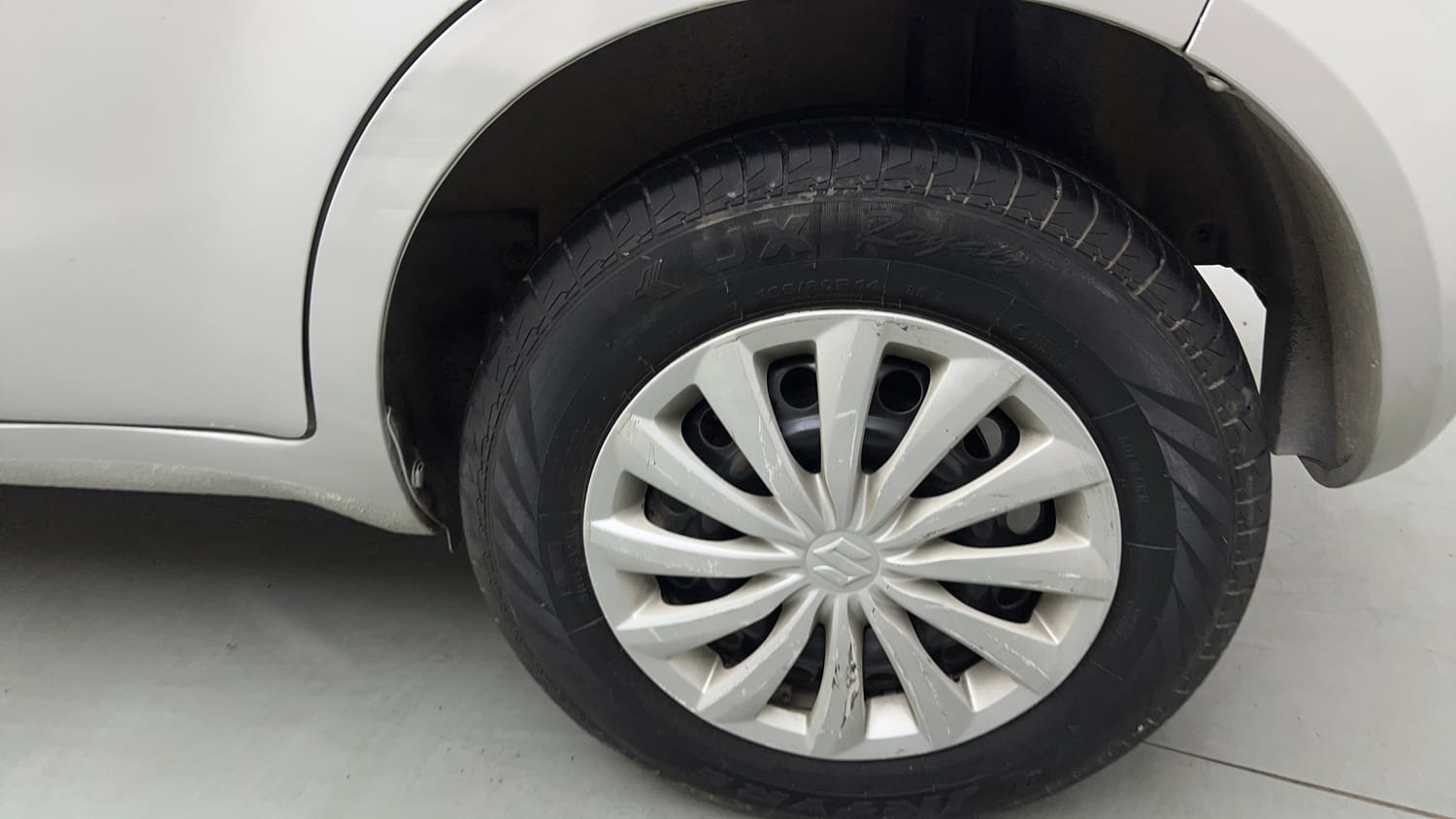 Used 2015 Maruti Suzuki Ritz Vxi BS-IV Petrol Manual tyres LEFT REAR TYRE RIM VIEW