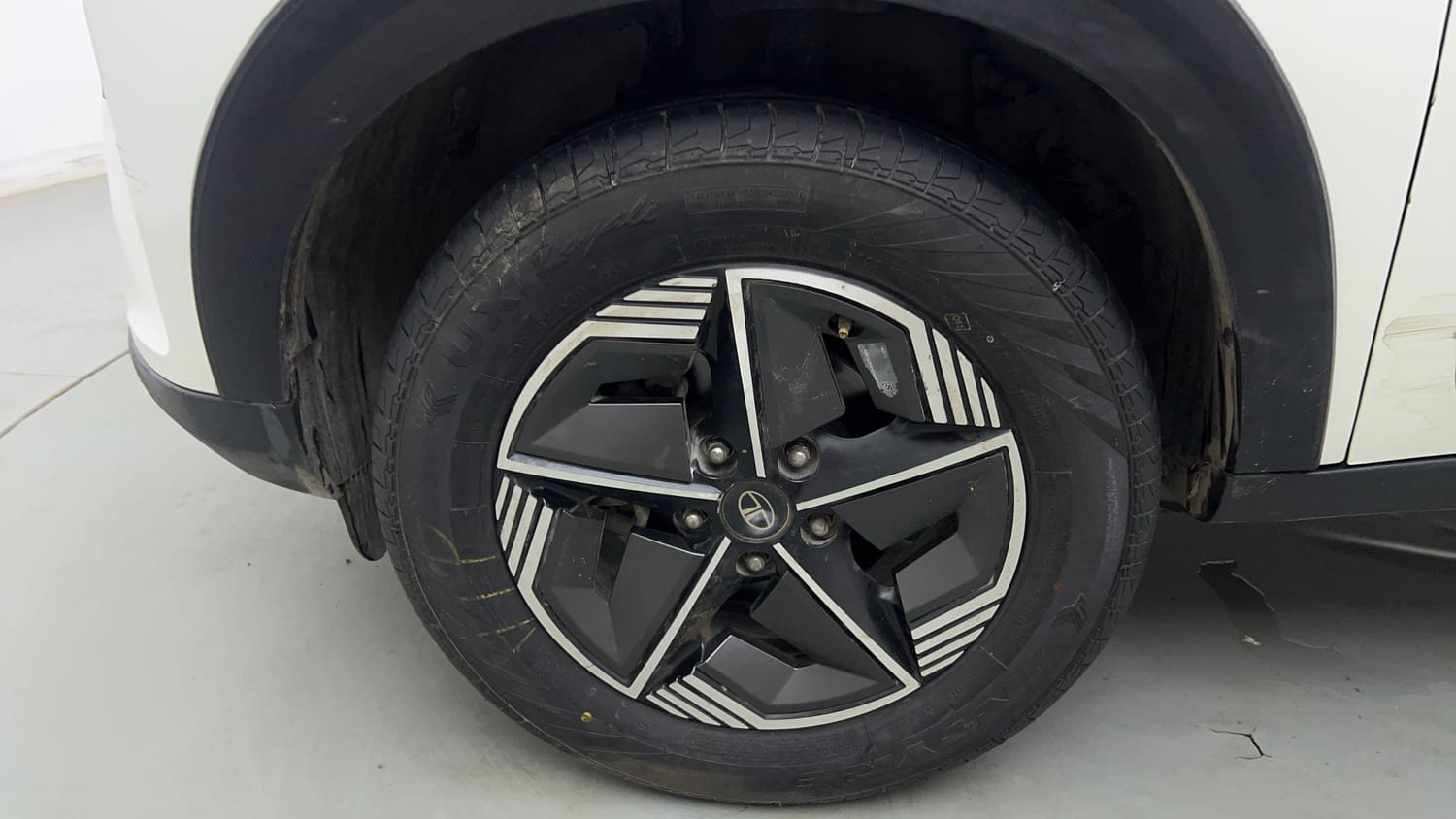 Used 2023 Tata Nexon Creative 1.2 Revotron Petrol 6MT Petrol Manual tyres LEFT FRONT TYRE RIM VIEW