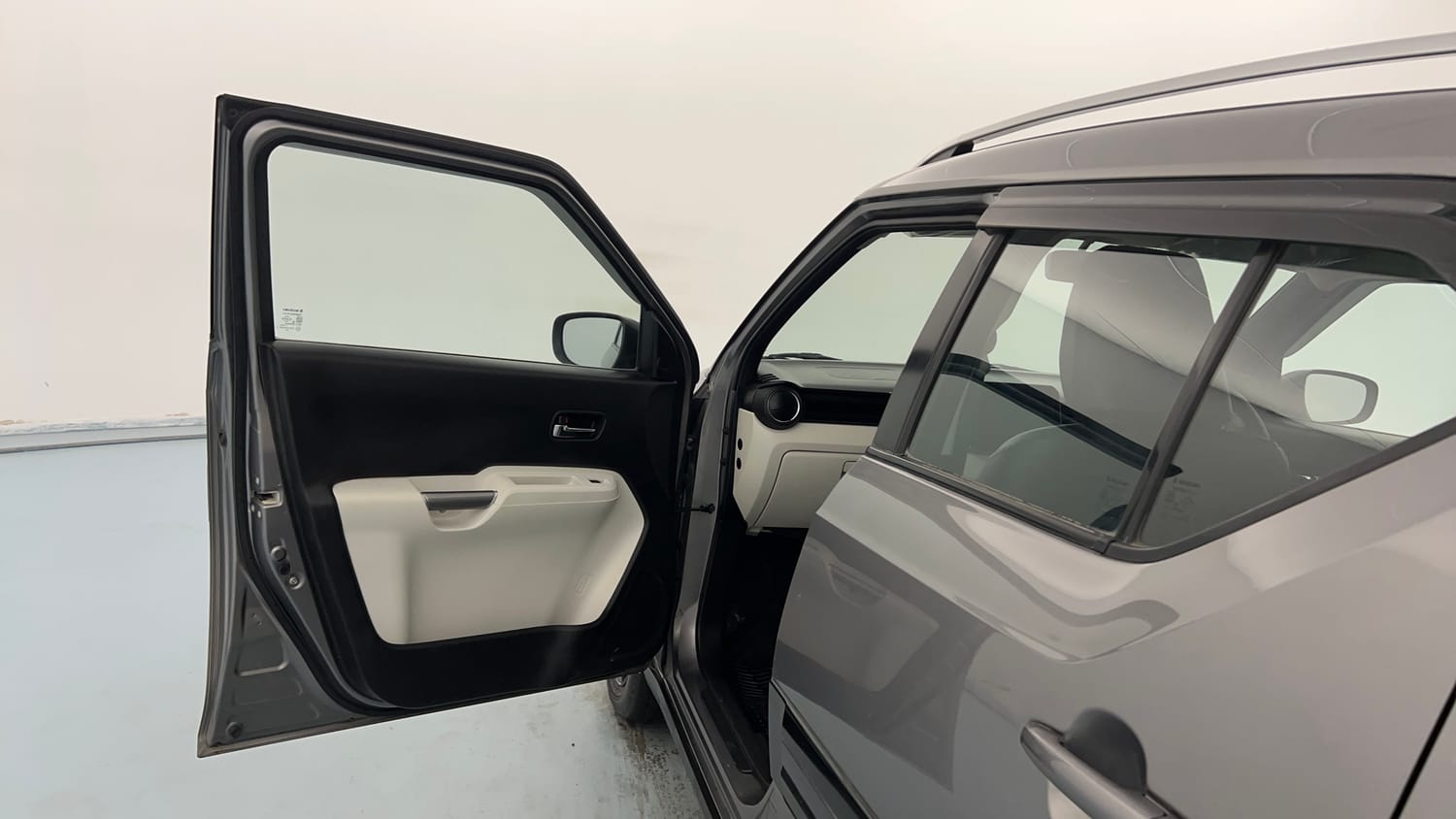 Used 2022 Maruti Suzuki Ignis Zeta 1.2 MT Petrol Manual interior LEFT FRONT DOOR OPEN VIEW