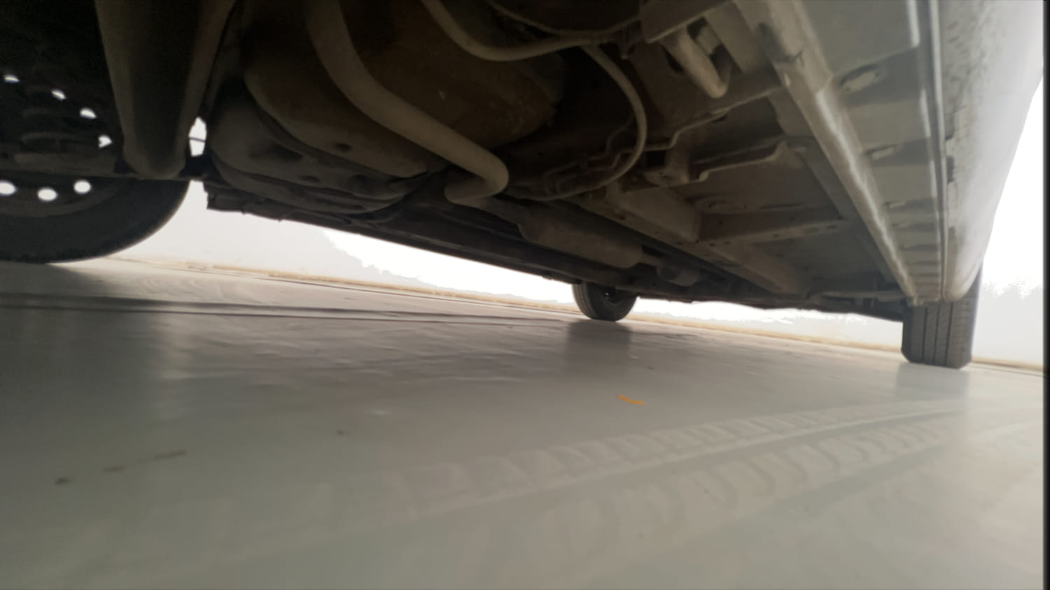 Used 2014 Maruti Suzuki Swift Dzire VXI Petrol Manual extra REAR RIGHT UNDERBODY VIEW
