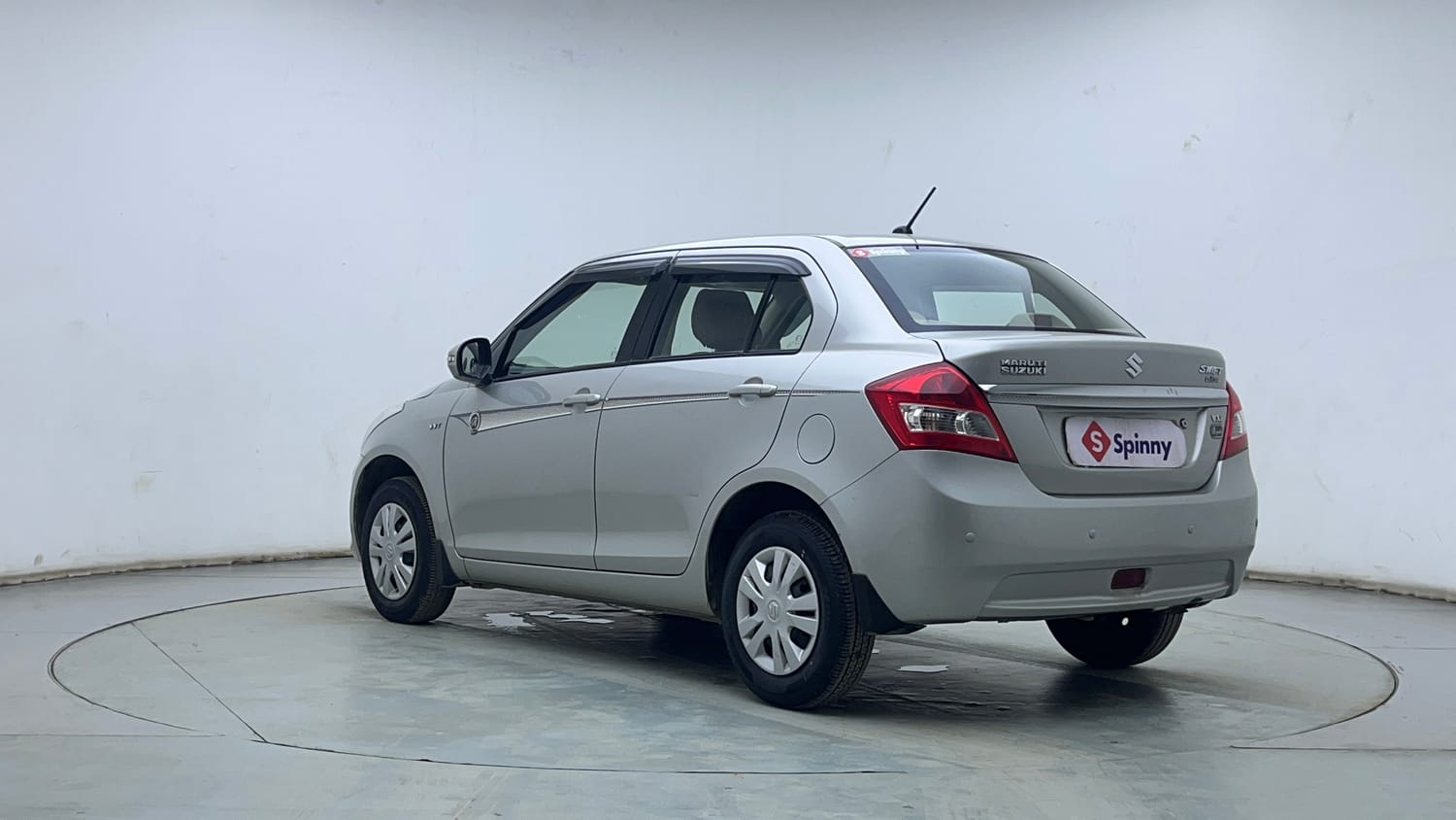 Used 2014 Maruti Suzuki Swift Dzire VXI Petrol Manual exterior LEFT REAR CORNER VIEW