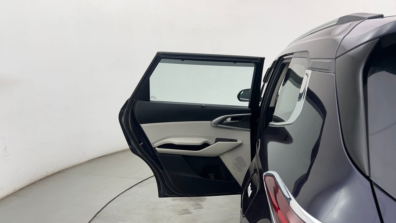 Used 2023 Kia Carens Prestige 1.4 Petrol MT 7 STR Petrol Manual interior LEFT REAR DOOR OPEN VIEW