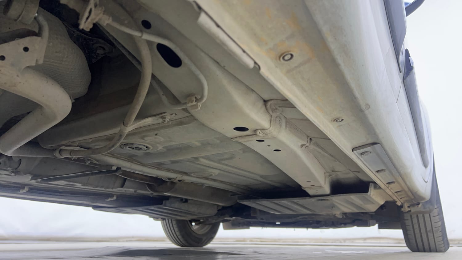 Used 2023 Maruti Suzuki Swift ZXi Plus AMT Petrol Automatic extra REAR RIGHT UNDERBODY VIEW