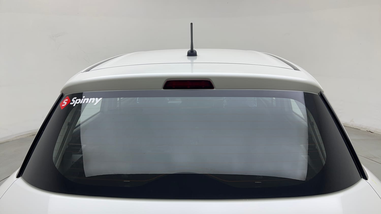 Used 2025 Maruti Suzuki Swift LXi Petrol Manual exterior BACK WINDSHIELD VIEW