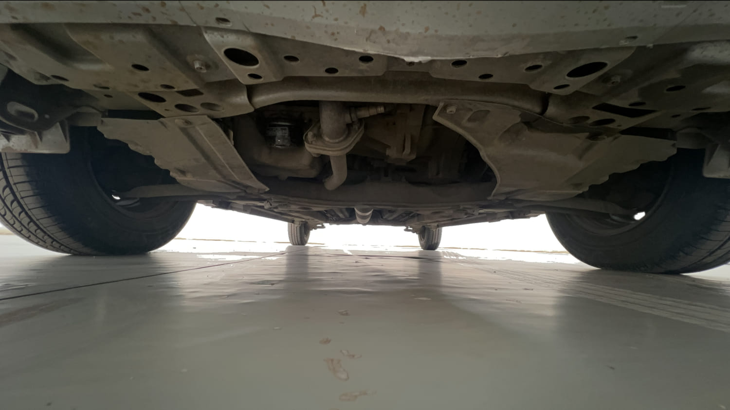 Used 2014 Maruti Suzuki Swift Dzire VXI Petrol Manual extra FRONT LEFT UNDERBODY VIEW