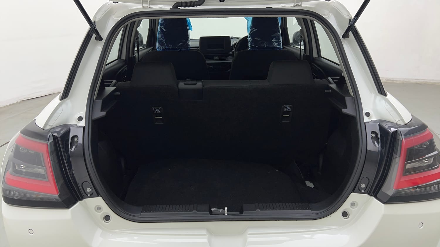 Used 2025 Maruti Suzuki Swift LXi Petrol Manual interior DICKY INSIDE VIEW