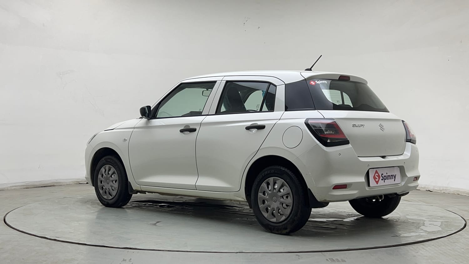 Used 2025 Maruti Suzuki Swift LXi Petrol Manual exterior LEFT REAR CORNER VIEW