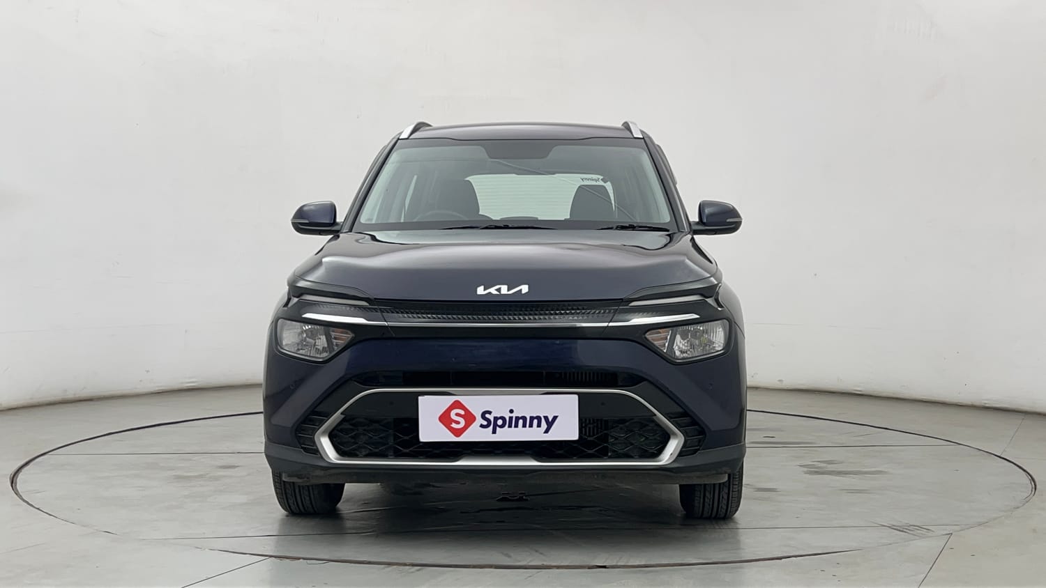 Used 2023 Kia Carens Prestige 1.4 Petrol MT 7 STR Petrol Manual exterior FRONT VIEW